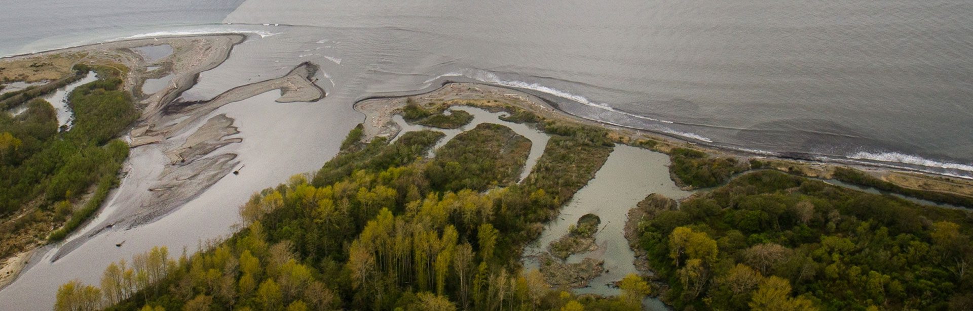 overhead picture of beach and land meeting