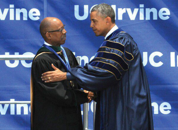 Former Chancellor Drake shakes former President Obama's hand